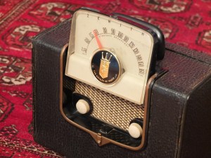 Zenith radio, dial and knobs exposed.