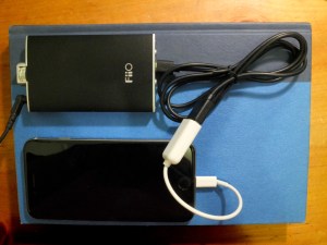 Fiio Q1, Micro USB cable, USB Lightning camer adapter, and iPhone